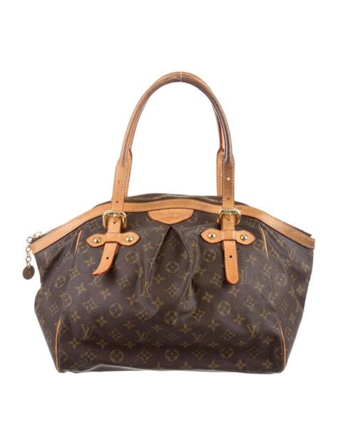 donna con la louis vuitton tivoli gm|Louis Vuitton Monogram Tivoli PM/GM Bag Reference Guide.